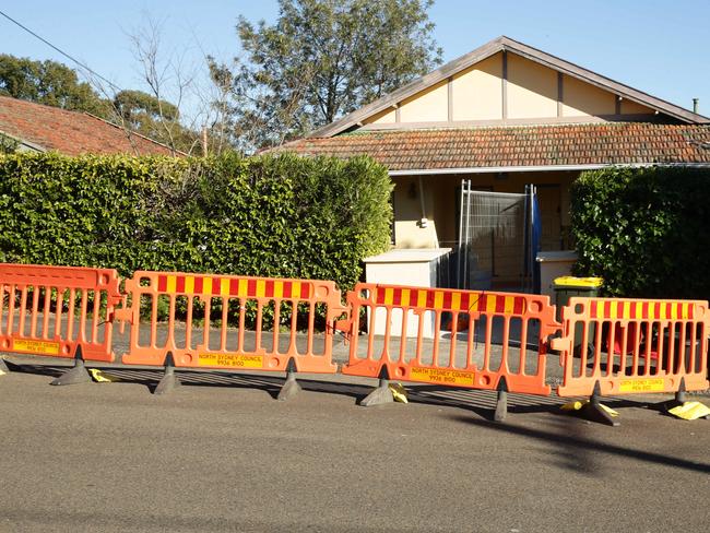 Barriers have been erected around this wall on Macpherson Rd, Cremorne.