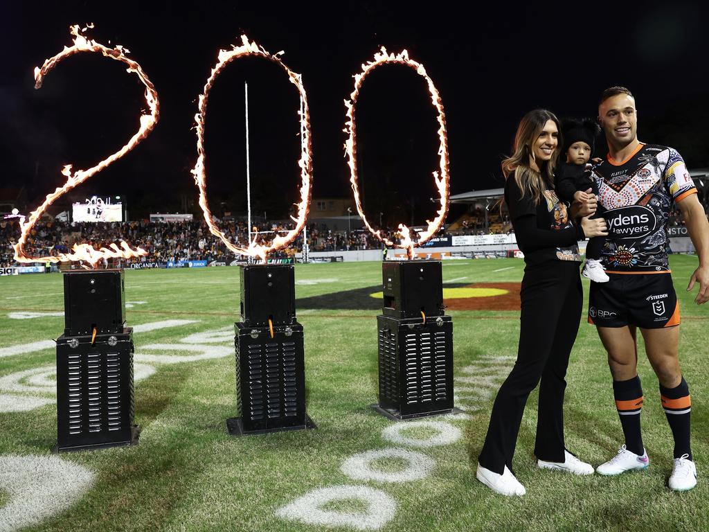 Luke Brooks, pictured celebrating his 200th NRL game, is as Tigers as they come. Picture: Getty Images