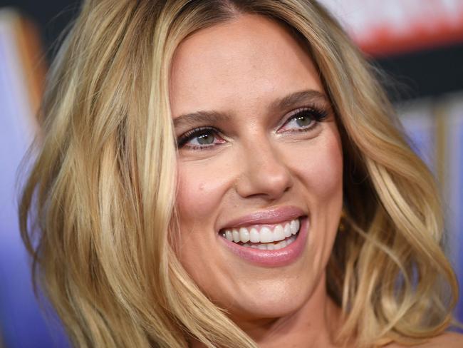 (FILES) In this file photo taken on April 22, 2019 US actress Scarlett Johansson arrives for the World premiere of Marvel Studios' "Avengers: Endgame" at the Los Angeles Convention Center in Los Angeles. - Disney delayed "Black Widow" and multiple other superhero films and animations Tuesday, March 23, dampening hopes of a swift recovery for US movie theaters that have only just reopened after a year's pandemic-mandated closure. "Black Widow" starring Scarlett Johansson had been billed as the major spring release to entice fans back to multiplexes, which were permitted to restart at limited capacity in Los Angeles last week and New York earlier this month. (Photo by VALERIE MACON / AFP)