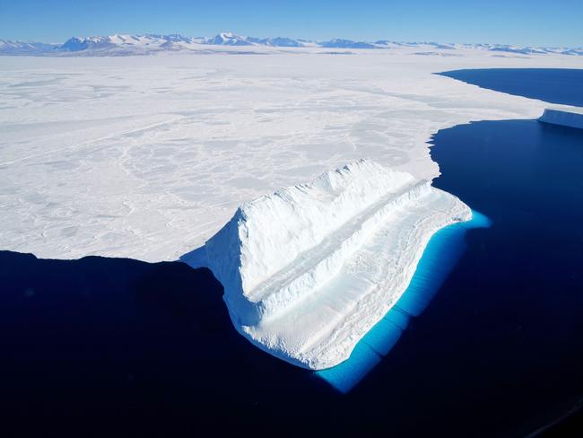 This file NASA image shows an iceberg floating in Antarctica's McMurdo Sound. - Global warming is melting ice in Antarctica faster than ever before -- about six times more per year now than 40 years ago. Picture: NASA