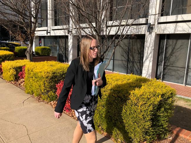 Defence lawyer Bridie Harders leaves ACT Magistrates Court.