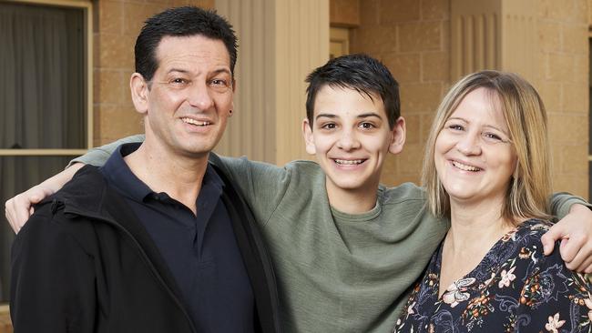 Adam and Judy Sharp with their son, Riley, 13. The family are looking for a new home in Rostrevor. Picture: Matt Loxton