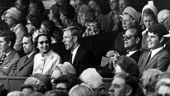 Queen Elizabeth II, Prince Philip, Prince Charles and Princess Anne watch a VFL game at the MCG in 1970.