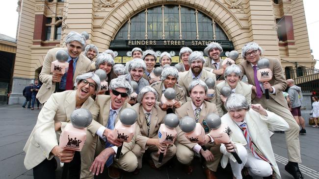 NOTE: To hold for Dec 26: The Richies, the group of cricket fans who dress as Richie Benaud, ready for the Boxing Day test. They are getting trains to the MCG and a train from Flinders St to Richmond Station. Picture Andrew Tauber