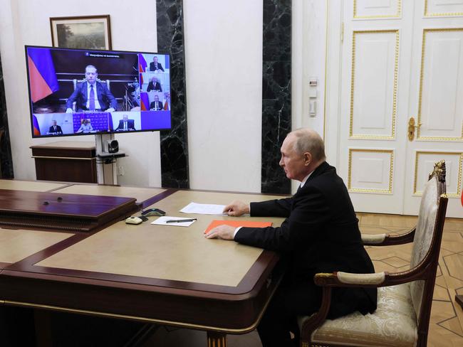 Russian President Vladimir Putin chairing a Security Council meeting in images released after his visit to Beijing. Picture: AFP