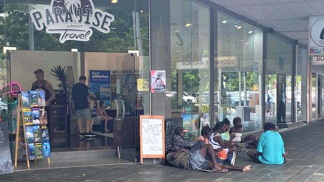 A group of itinerants on the footpath outside a business at the corner of Lake and Shields streets in the Cairns CBD earlier this year. Picture: Supplied