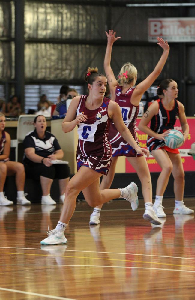 Netball action from QISSN 2024 in Townsville. Carmel College v Shalom College