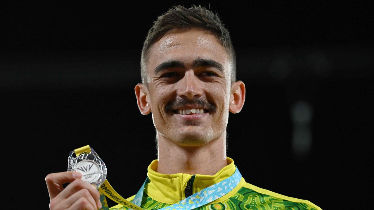 Australia's Brandon Starc celebrates after winning a silver medal. Picture: Ben Stansall / AFP