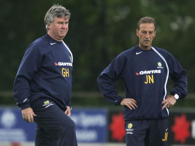 EINDHOVEN, NETHERLANDS - MAY 29:  Australian coach Guus Hiddink looks on with his assistants Graham Arnold and Johan Neeskens during a training session as Australia prepare for the 2006 World Cup, held at the Mierlo training ground May 29, 2006 in Eindhoven, Netherlands.  (Photo by Robert Cianflone/Getty Images)