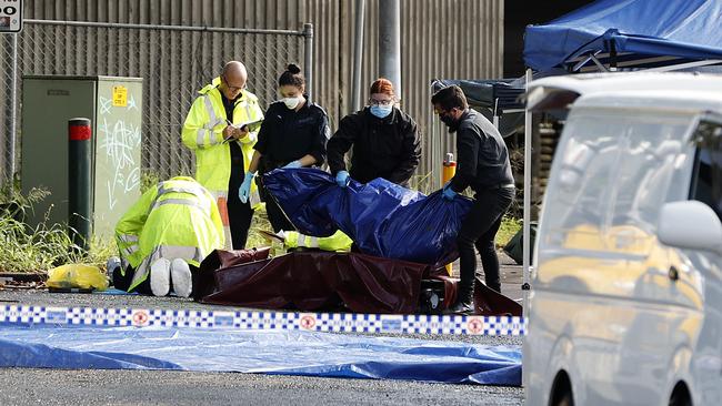 Chami’s body on the side of the road in Holroyd. Picture: Tim Hunter