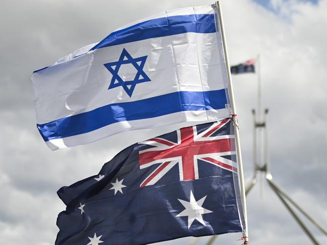 CANBERRA, Australia - NewsWire Photos - October 7, 2024: Thousands of attendees gather at Parliament House in Canberra taking an historic stand against antisemitism and to stand in support of Israel.  Picture: NewsWire / Martin Ollman