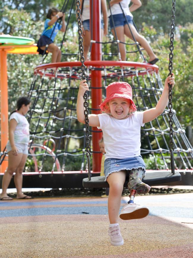 Mia Stewart, 4, at an inclusive playground.