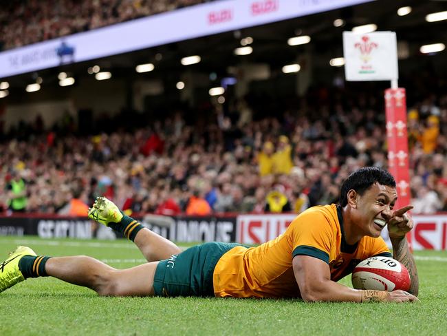 Len Ikitau scores against Wales during the Autumn Nations Series 2024 match. Picture: David Rogers/Getty Images