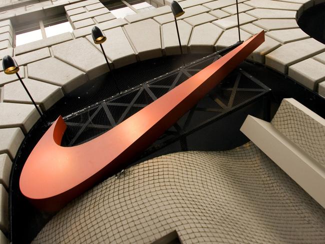 The Nike swoosh logo graces the front of the Niketown store in downtown Portland, Oregon, 29/09/2009.