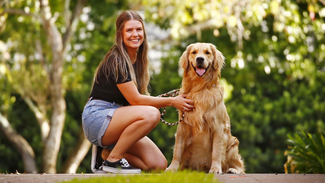 Erin Adams pictured with her Golden Retriever Archie loves special sustainable dog treats made with insect protein. Picture: Sam Ruttyn