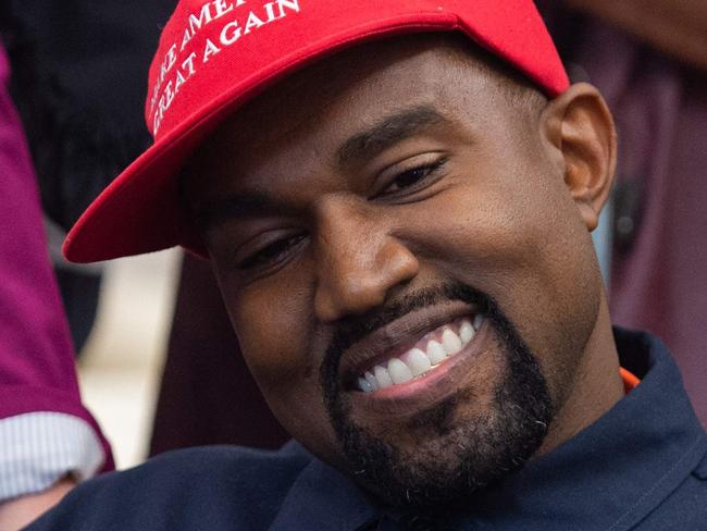 (Files) in this file photo rapper Kanye West speaks during his meeting with US President Donald Trump in the Oval Office of the White House in Washington, DC, on October 11, 2018. - Kanye West, the entertainment mogul who urges listeners in one song to "reach for the stars, so if you fall, you land on a cloud," announced SJuly 4, 2020, he is challenging Donald Trump for the US presidency in 2020. (Photo by SAUL LOEB / AFP)