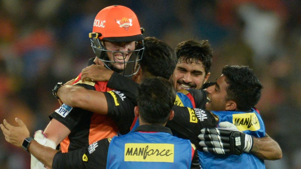 Sunrisers Hyderabad players hug Billy Stanlake after his last ball four.