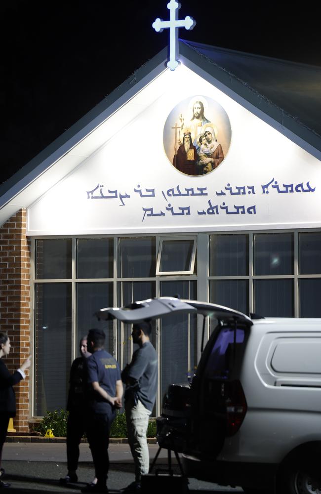 Police officers collecting evidence at the Christ The Good Shepherd Church in Wakeley after the terror attack and riot. Picture: Jonathan Ng