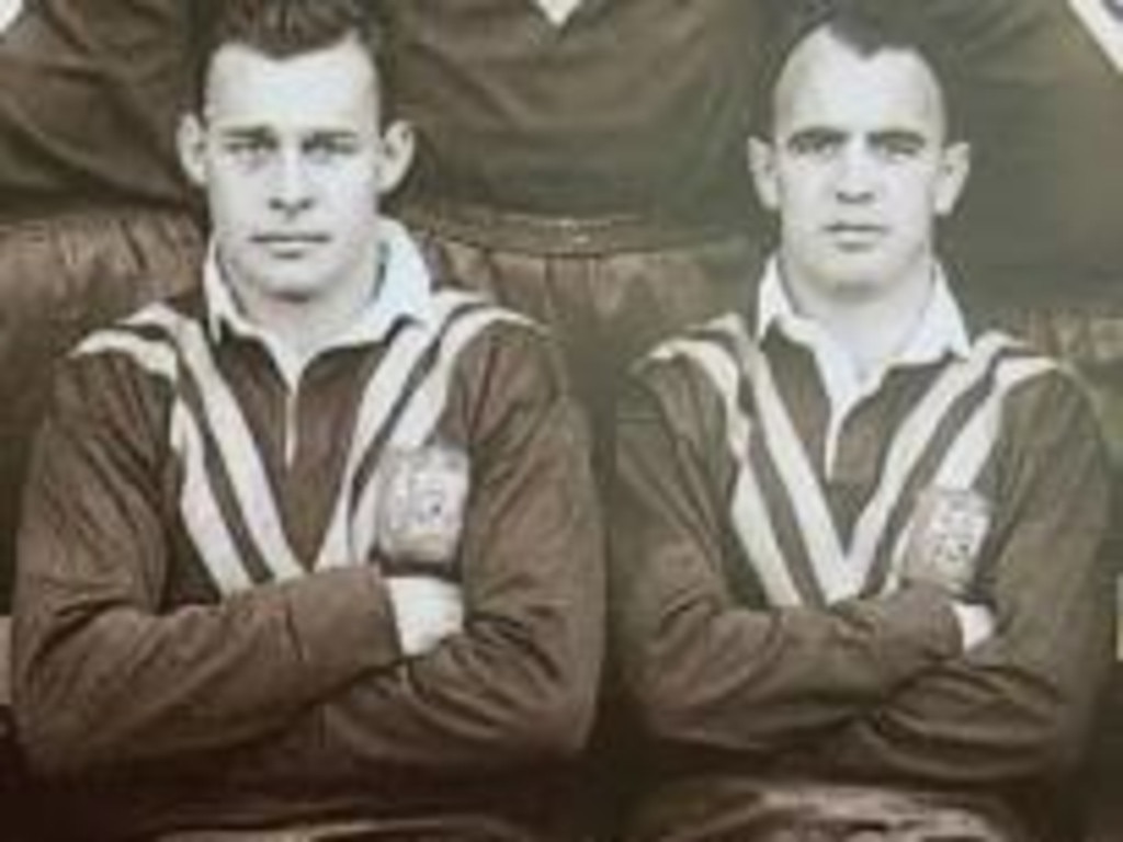 Alex Watson (left) sitting with Immortal Clive Churchill in the Australian team photo from 1955.