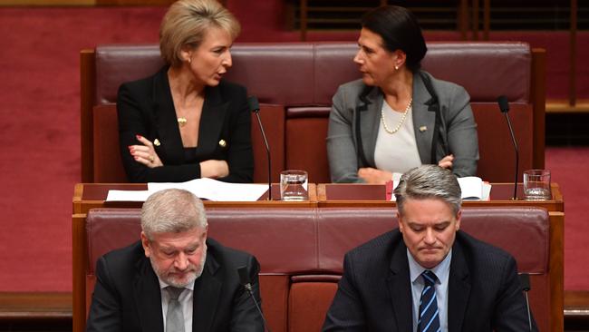 Former Cabinet ministers Michaelia Cash, Concetta Fierravanti-Wells, Mitch Fifield and Mathias Cormann sit on the backbench during Senate Question Time yesterday.