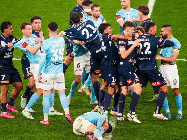 Victory and City players scuffle after Victory’s Joshua Inserra was shown a yellow card for a tackle on City’s Marco Tilio. Picture: Getty Images