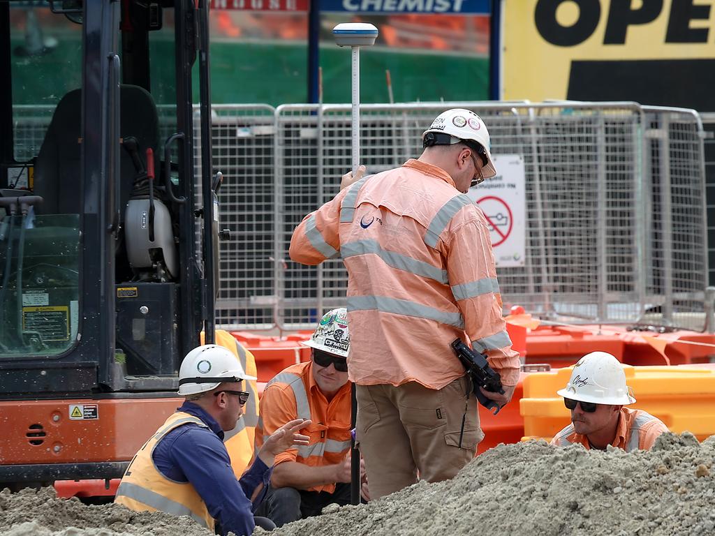 Workers on site at the Suburban Railway Loop in Box Hill. Picture: Ian Currie