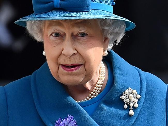 (FILES) This file photo taken on March 13, 2015 shows Britain's Queen Elizabeth II (L) and Britain's Prince Philip, Duke of Edinburgh, leaving St Paul's Cathedral in London after attending a memorial service to mark the end of Britain's combat operations in Afghanistan. Britain's Prince Philip, the 95-year-old husband of Queen Elizabeth II, will retire from public engagements later this year, Buckingham Palace said on May 4, 2017. / AFP PHOTO / BEN STANSALL