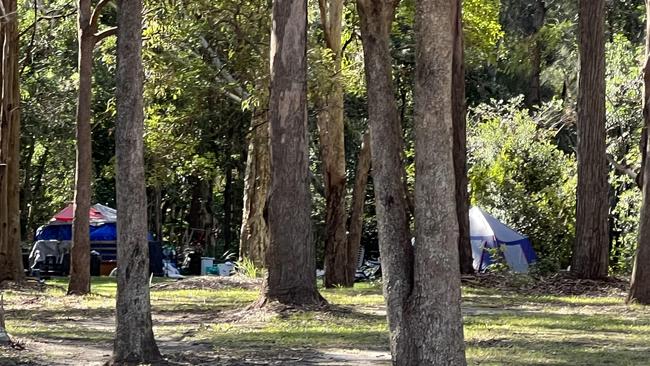 Tents visible from the light rail line on Queen St in Southport.