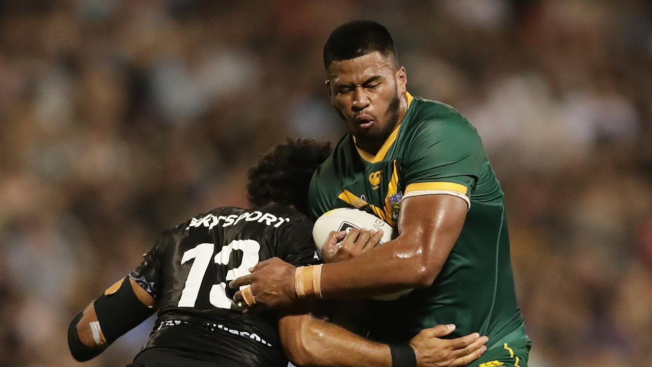 Payne Haas of Australia is tackled during the Test Match between Australia and the Kiwis