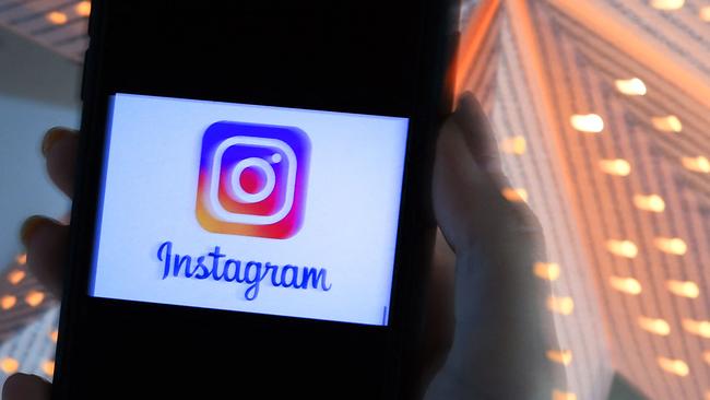 Dr Oboler says that young people spreading extremist ideas gleaned from alternative social media on the comments section of Instagram posts. (Photo by OLIVIER DOULIERY / AFP)
