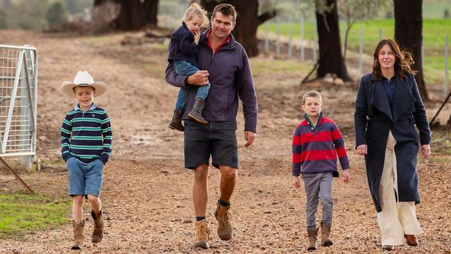Kirsty Evans, a director of the Cheney Suthers law firm, with husband Tom and children, from left, Sonny, Edie and Henry near Molong, NSW. Picture: Kim Storey
