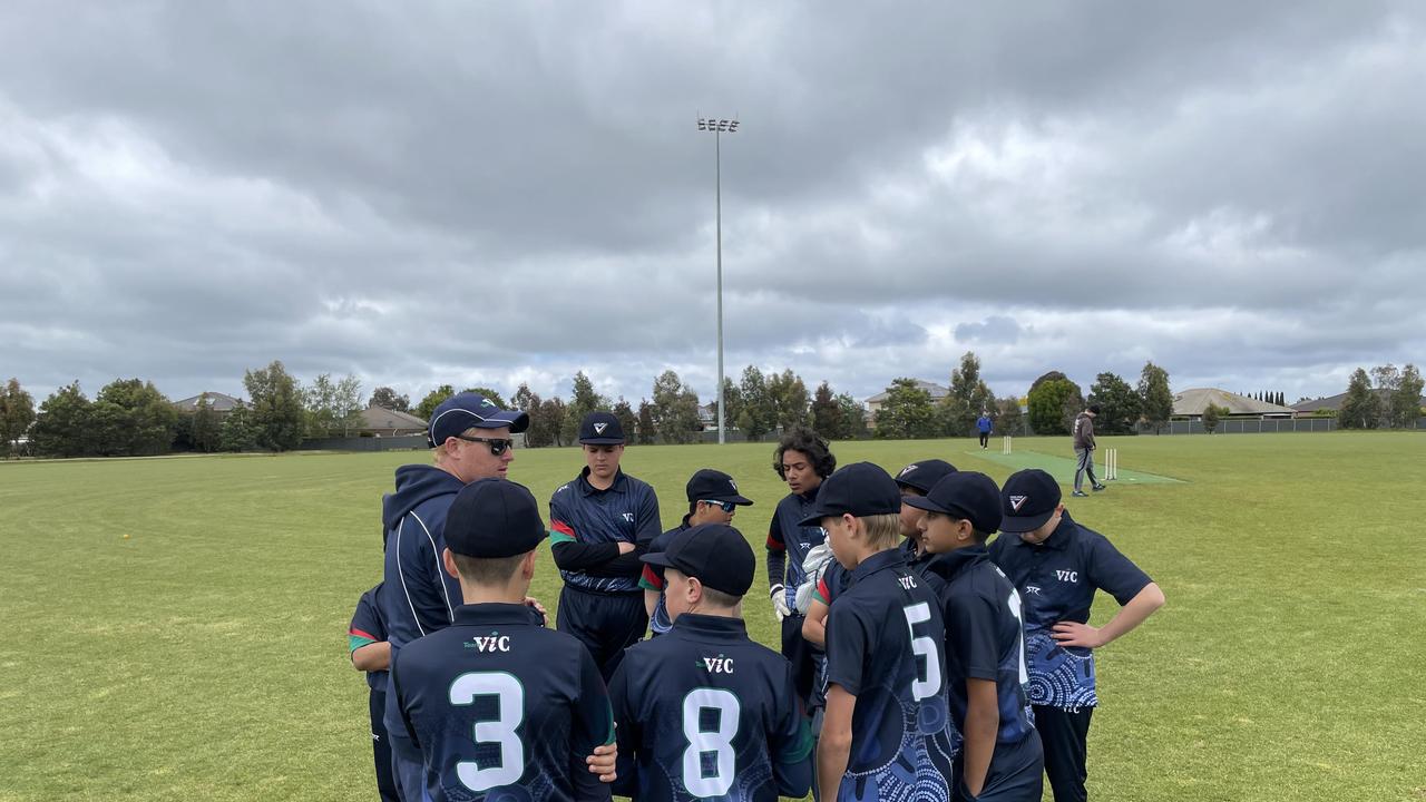 The Victoria White team get together in a huddle. Picture: Shane Jones.