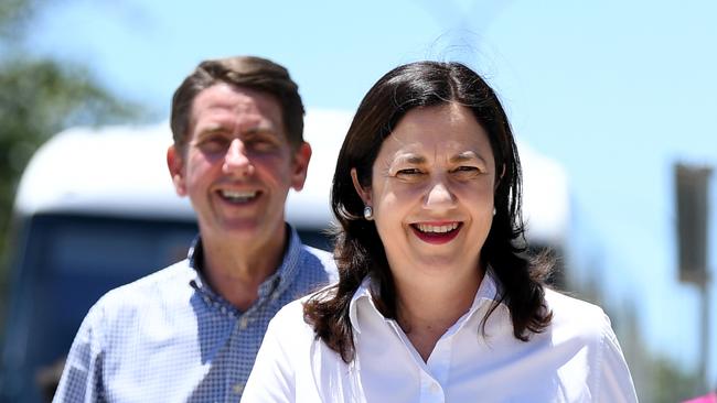 Queensland Premier Annastacia Palaszczuk, with Treasurer Cameron Dick behind, on a school visit on Friday. Picture: NCA NewsWire/Dan Peled