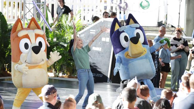 Bluey, right, and her sister Bingo led Queenslanders the world record attempt for the biggest game of Keep Uppy at Southbank on Sunday morning. Picture Lachie Millard