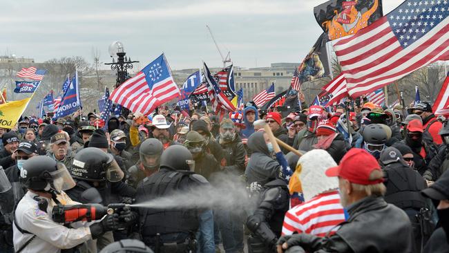 Trump supporters clash with police and security forces as people try to storm the US Capitol Building in Washington, DC, on January 6, 2021. Picture: AFP