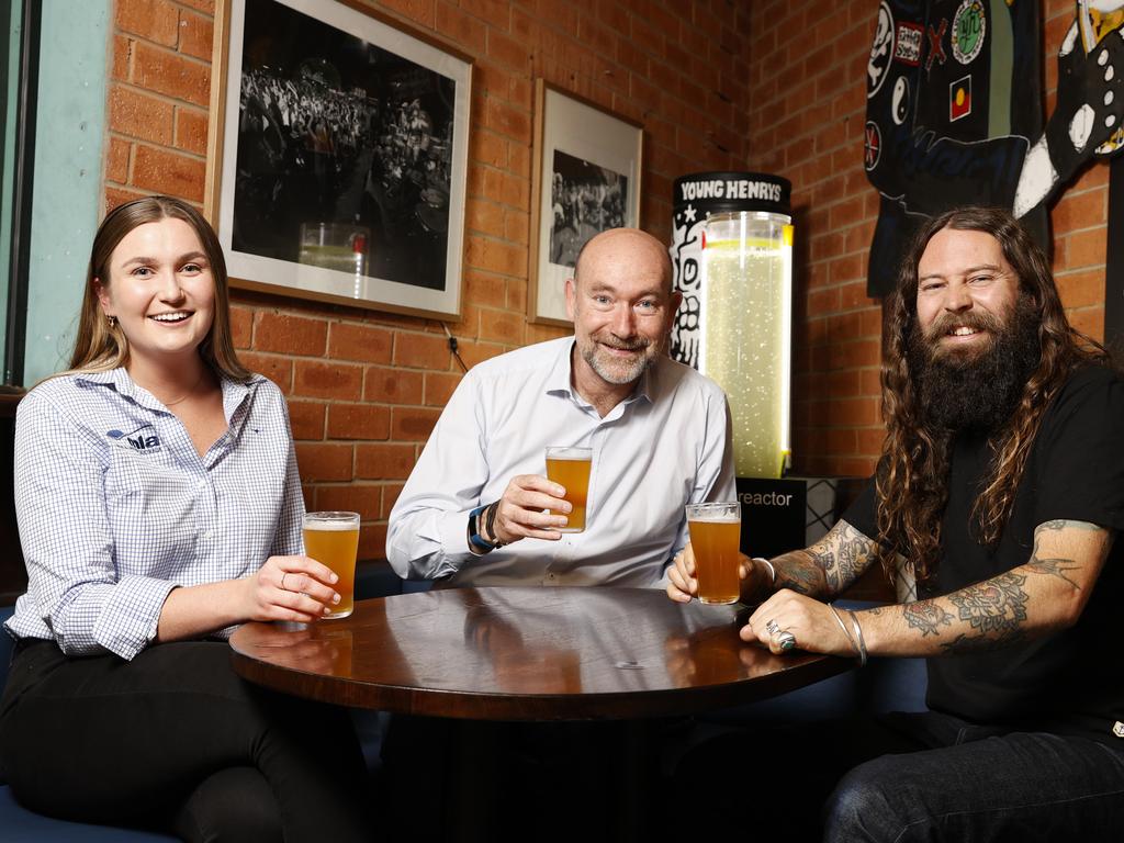 Here’s cheers to good ideas, with beers: Penny Graham, Prof Peter Ralph and Oscar McMahon. Picture: Jonathan Ng