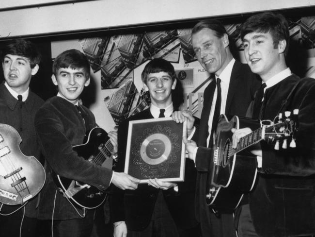 George Martin (second from the right) with members of the Beatles. Picture: Chris Ware/Keystone/Getty Images