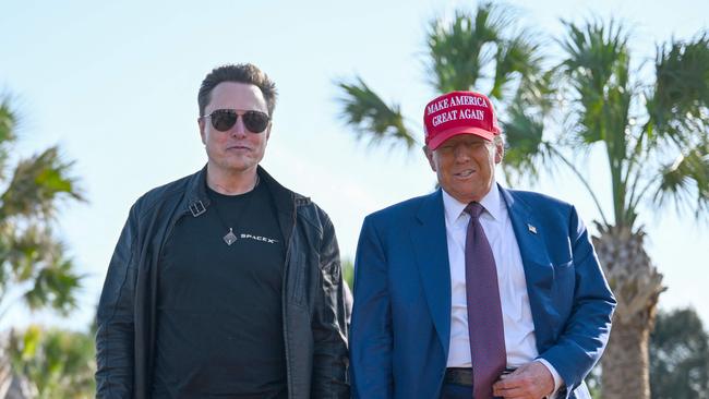 President-elect Donald Trump greets Elon Musk as he arrives to attend a viewing of the launch of the sixth test flight of the SpaceX Starship rocket.