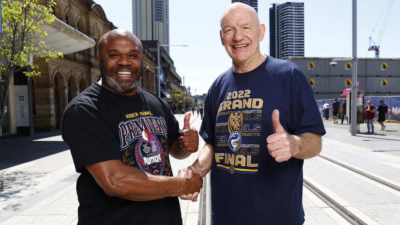 Former Penrith Panthers player Rhys Wesser and Parramatta Eels legend Peter Wynn outside his shop on Sunday. Picture: Richard Dobson