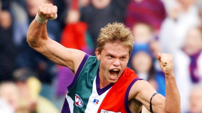 Docker Byron Schammer celebrates after kicking a goal to help beat the Brisbane Lions by 3 points.