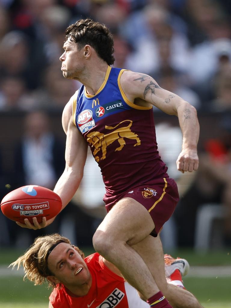 Lachie Neale gets a handball away. Picture: Darrian Traynor/AFL Photos/via Getty Images