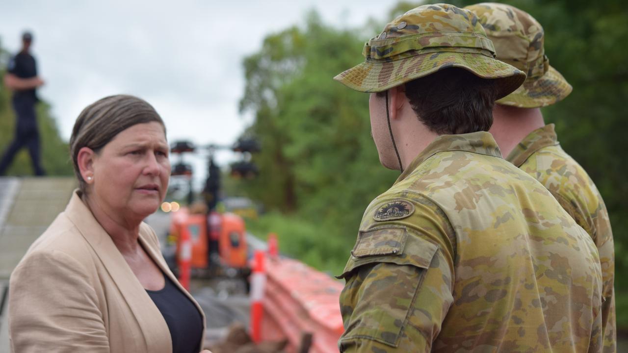 Member for Mundingburra, Janelle Poole talking to soldiers from 3CER at the site of Ollera Creek crossing which was damaged by flood waters.