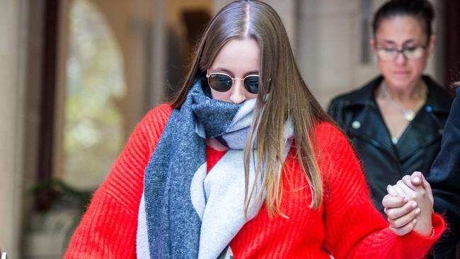 Sarah Ristevski leaves the court after attending her father's sentencing hearing. Picture: Jake Nowakowski