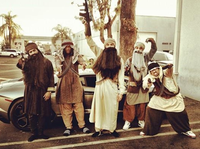 Chris Brown and friends dressed as terrorists.