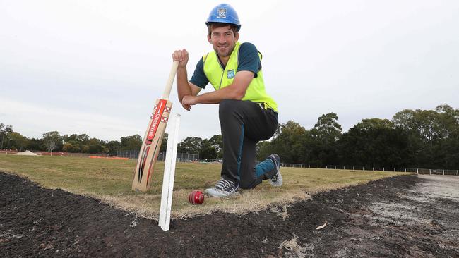 Joe Burns with soil from cricket pitches around Australia, including SCG. Pic Annette Dew