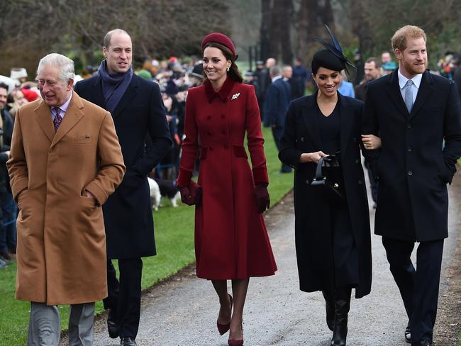 Prince Charles (left) with William, Kate, Meghan and Harry. Picture: AFP