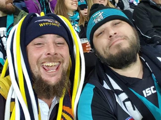 Aaron Worthington, who ended his life in February 2025, with his foster brother Brian Collins at a Port Adelaide game. Picture: Supplied by family