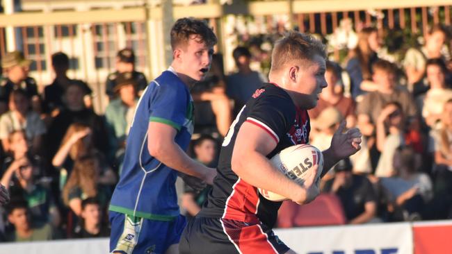 Emmaus College backrower Josh Nilon makes a charging run in the Dolphins Cup grand final against The Cathedral College.