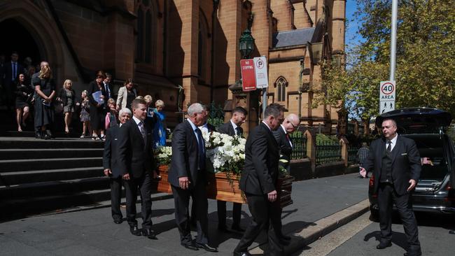 Walsh’s friends and family follow his casket out of the church. Picture: NCA NewsWire / Justin Lloyd