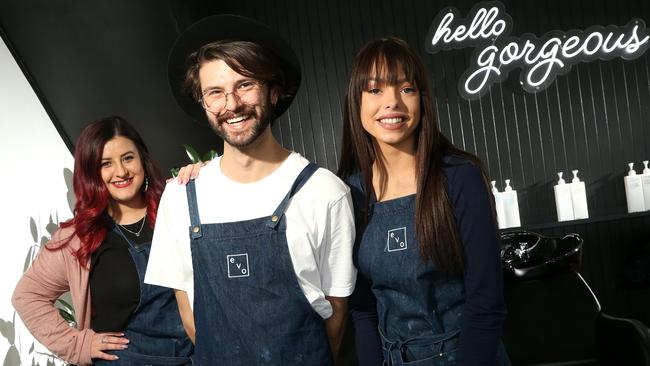 Number 1: Komotis.J Hairdressing Salon owner Jorge Gogonis with Lauren Dispenzeri and Mia Hamilton. Picture: Hamish Blair